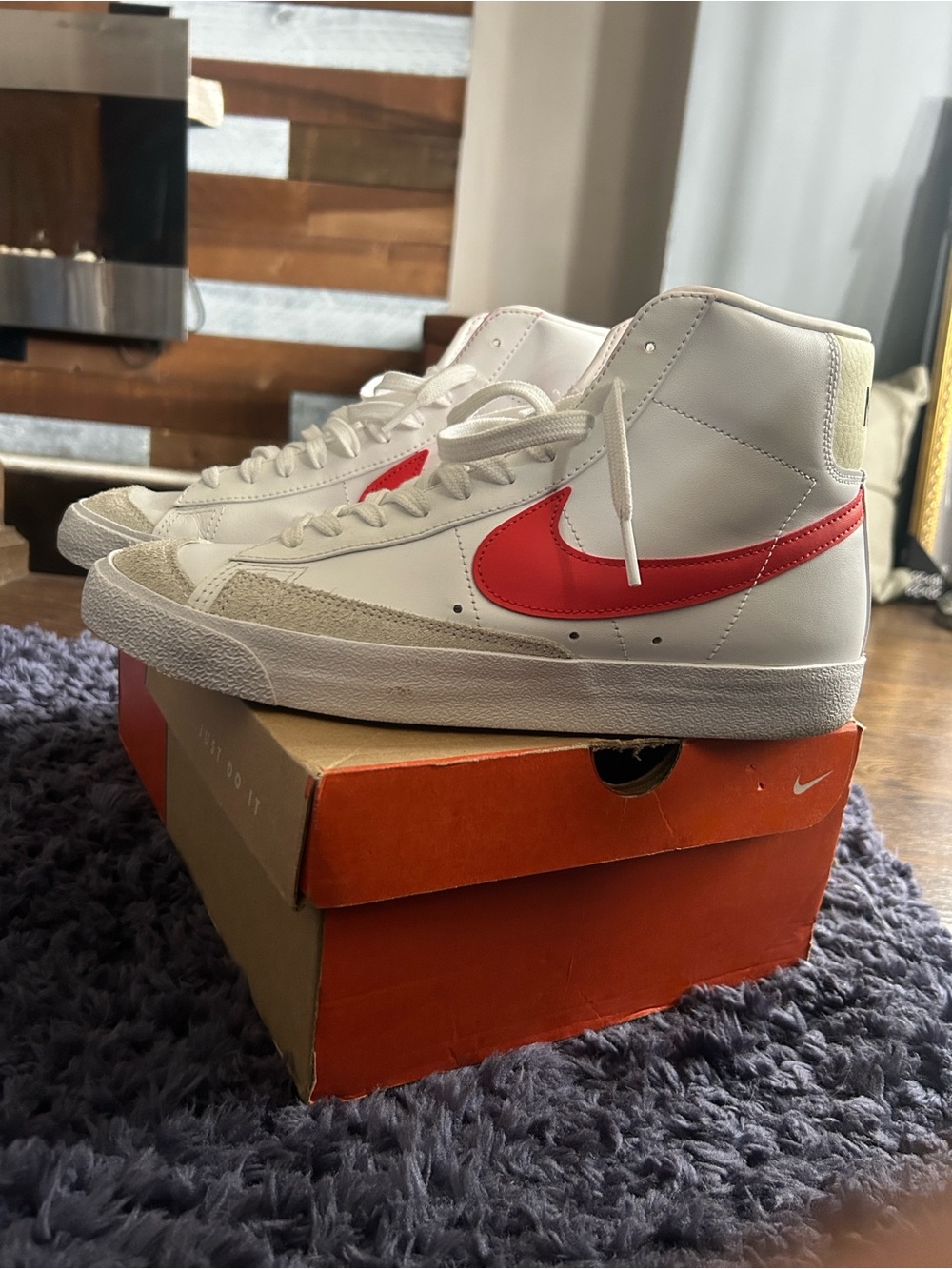 Nike White High-Top Sneakers with Red Swoosh